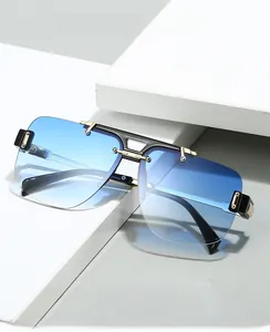 Detail of luxury half-rim square sunglasses with blue gradient lenses and gold metal accents