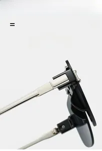 Detail view of durable metal hinge on semi-rimless square sunglasses for a secure fit