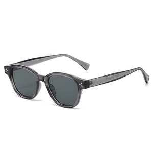 Classic oval dark grey translucent sunglasses with silver triple rivet details