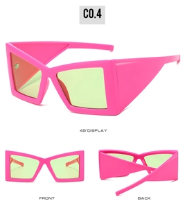 Detailed views of neon hot pink oversized cat eye sunglasses from front and side angles