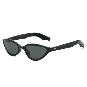 Classic black cat-eye sunglasses with silver dot accents and dark gray lenses