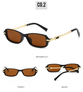 Detail view of small rectangular vintage sunglasses with black frames and gold metal temples