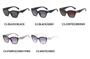 Detail view of five trendy cat-eye sunglasses featuring unique textured temple patterns