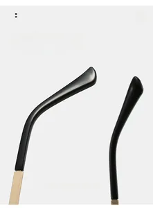 Detail of curved sunglasses legs with gold metal hinge for comfortable ergonomic wear