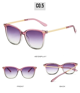 Detailed view of oversized cat-eye sunglasses with woven gold temples and pink frames