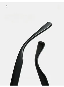 Close-up of ergonomic curved sunglasses temples in glossy black for comfortable wear