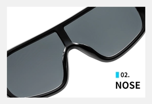 Macro detail of the seamless integrated nose pads on black oversized sunglasses