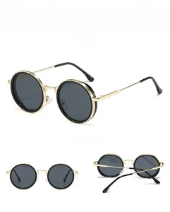 Detailed views of round retro sunglasses with gold metal frames and black decorative edges