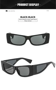 Détail de lunettes de soleil carrées noir brillant avec design triangle évidé chic