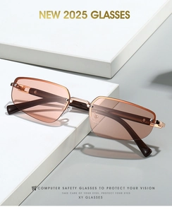 Detail of 2025 rimless sunglasses with gradient brown lenses and gold metal frame