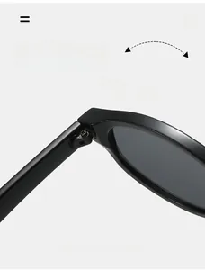 Detail shot of durable metal hinges on cool street style black sunglasses with dark lenses
