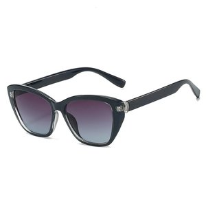 Fashion cat eye sunglasses for women with black resin frame and blue gradient lenses