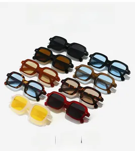 Flat lay of square frame sunglasses in nine various colors with smooth resin finish