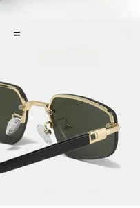 Macro view of sunglasses featuring gold metal hinges and clear silicone nose pads