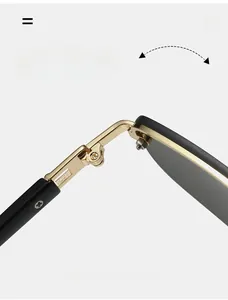 Close-up of a durable gold metal hinge on trendy black frame sunglasses
