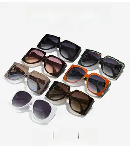 Collection of oversized square sunglasses in seven colors with thick frames and gradient lenses