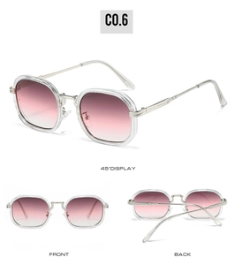 Détail des lunettes de soleil carrées avec verres dégradés roses et branches en métal
