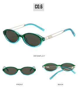 Detail view of oval teal sunglasses with silver metal temples and polarized lenses