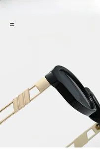Detailed macro view of lightweight hollow geometric temples and hinges on oval sunglasses