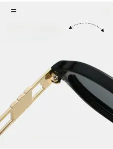 Detailed macro view of durable reinforced metal hinges on oval black sunglasses