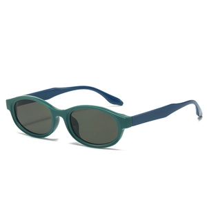 Oval dark green sunglasses with blue temples in a minimalist cool street style aesthetic