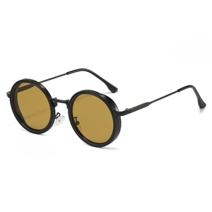 Retro punk round sunglasses with black textured frames and amber lenses for trendy street style