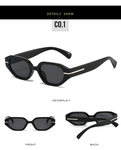 Detailed views of irregular oval black sunglasses with silver metallic temple accents