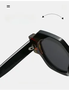 Detail of durable metal texture hinge on polygon oversized sunglasses with tortoise temples