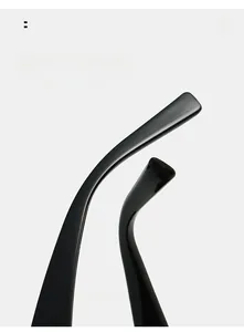 Macro view of curved black sunglasses legs showing high-gloss finish and comfortable arc design