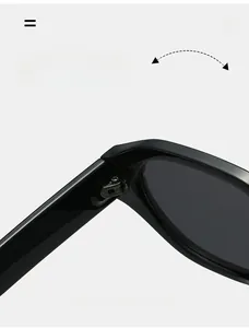 Macro view of durable metal hinge on irregular black sunglasses with premium texture