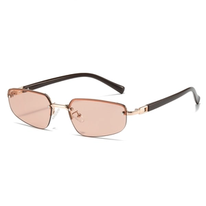 Fashionable rimless sunglasses with pink-brown lenses and gold accents in 45-degree view