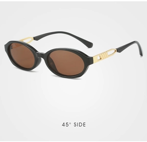 Detail view of 45-degree angle showing golden geometric hinge and brown lenses