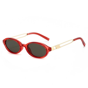 Retro oval sunglasses with red resin frame and gold hollow metal temples at 45-degree angle