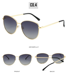 Trois vues de lunettes soleil papillon avec monture dorée et verres dégradés sombres