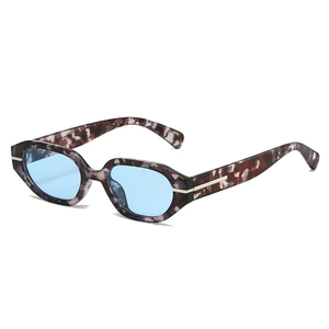 Vintage irregular oval sunglasses with blue lenses and tortoise frames for women