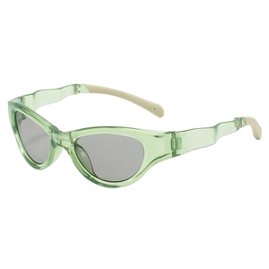 Occhiali da sole polarizzati cat-eye con montatura verde trasparente e aste a onde