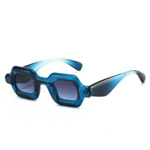 Deep blue translucent thick frame Y2K bubble sunglasses with dark gradient lenses