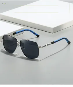 Detail of aviator sunglasses with silver metal double bridge and blue non-slip rubber tips