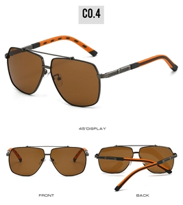 Detail view of bicolor square frame sunglasses with orange striped temples and brown lenses