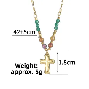 Detailed view of golden cross pendant necklace with colorful beads and dimension labels