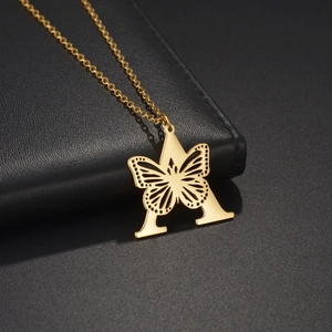 Collier Pendentif En Acier Inoxydable Papillon Creux Lettre Anglaise Initiale Bijoux Style Rétro Français Pour Femmes