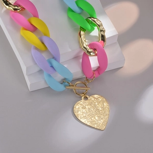 Colorful acrylic and gold chunky chain necklace with a hammered heart pendant