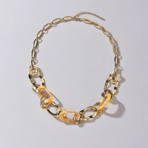 Minimalistische 14K vergoldete Edelstahl-Gliederkette mit bernsteinfarbenen Acryl-Gliedern