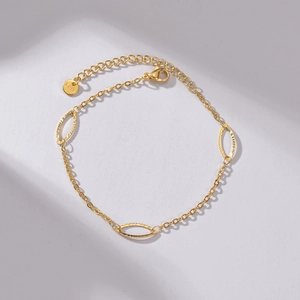 Minimalist 14K gold plated stainless steel bracelet with oval hollow engraved links
