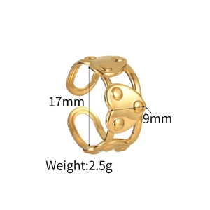 Minimalist gold heart open ring featuring textured dot details and adjustable band