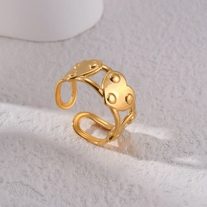 Minimalist gold heart ring with dotted texture and adjustable open band for women