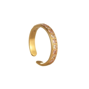 Detail of adjustable gold ring featuring a row of sparkling square-cut cubic zirconia