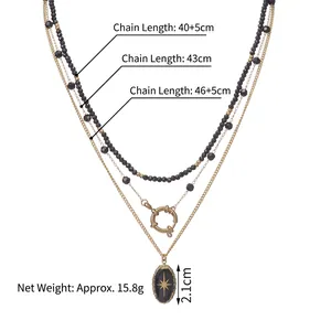 Collier multi-rangs en acier inoxydable doré 14K avec perles noires et pendentif étoile