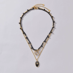 Collier double rang plaqué or 14K avec perles noires et pendentif étoile céleste