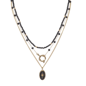 Collier multicouche en acier doré 14K avec perles noires et pendentif étoile gravé